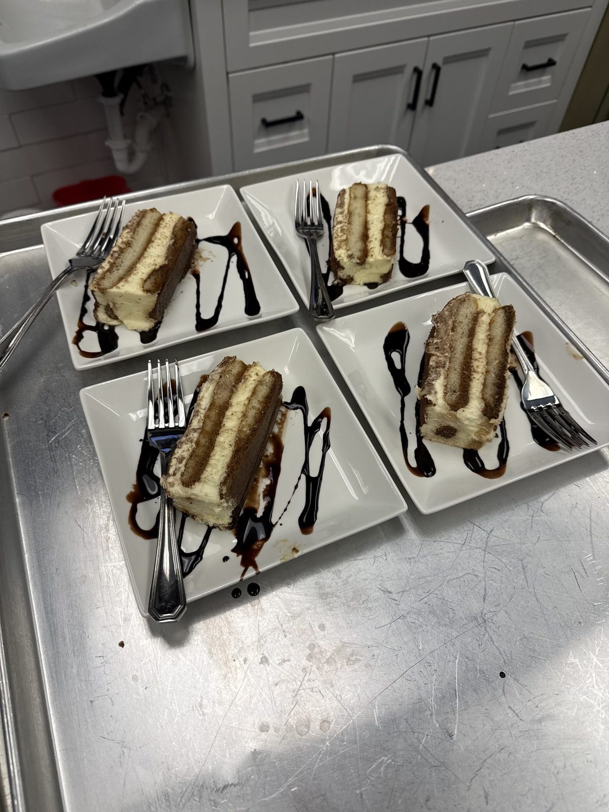 Plated slices on a kitchen tray